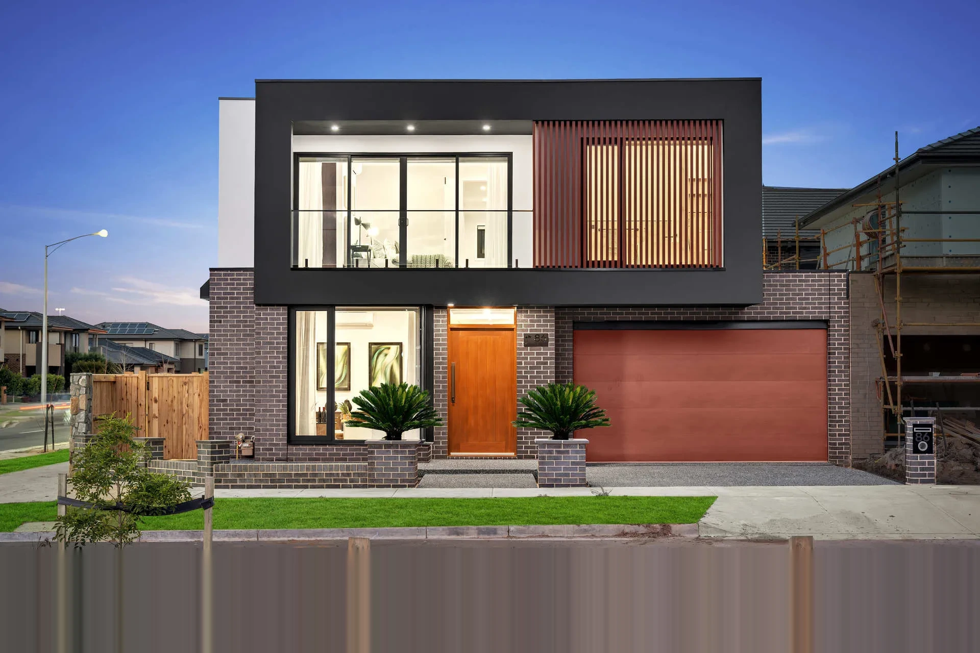 Modern Berwick home with sleek black aluminium window and door systems
