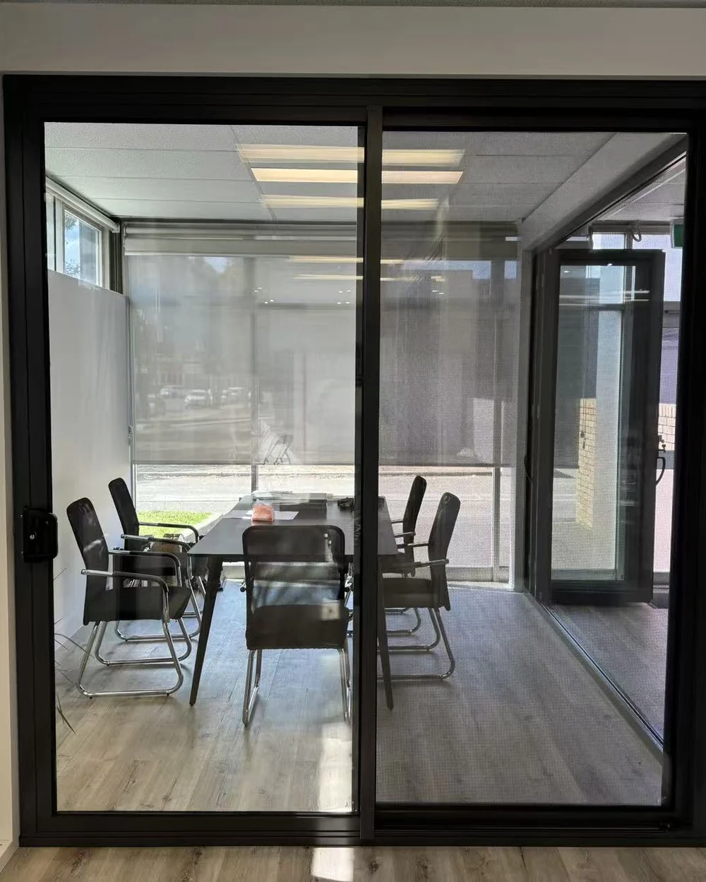 Black aluminium sliding door display at the Iconic Windows showroom in Melbourne