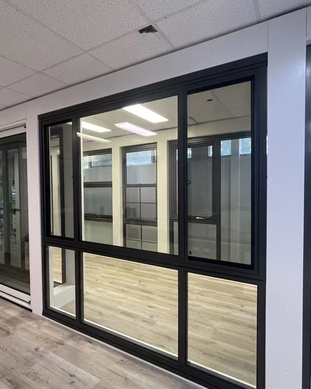 Black aluminium fixed and opening window display suitable for Clayton homes and units